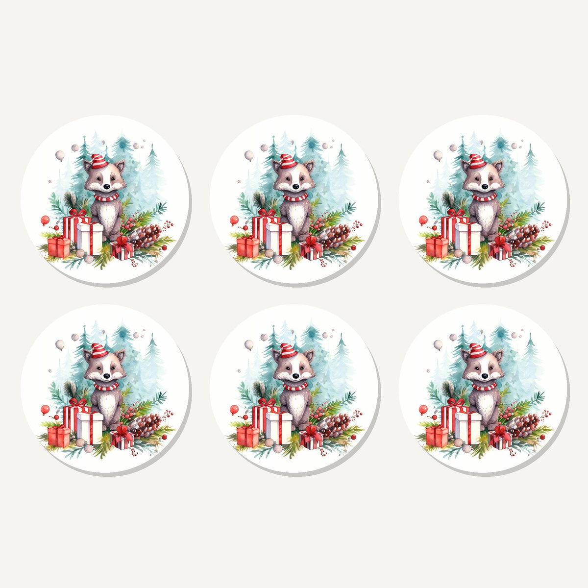 Flat lay of the christmas woodland animal with presents artwork on six round coasters