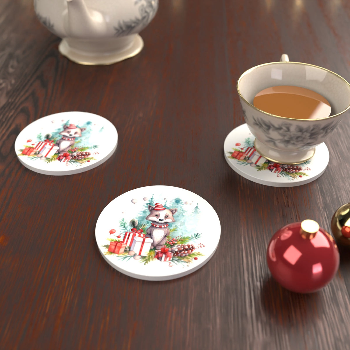 Christmas Woodland Animal with Presents Round Ceramic Coasters – Set of 6 – lifestyle mockup with a teacup