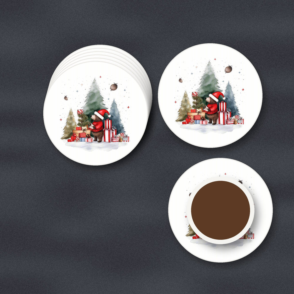 Little Bear with Christmas Presents round ceramic coasters stacked on a slate kitchen worktop