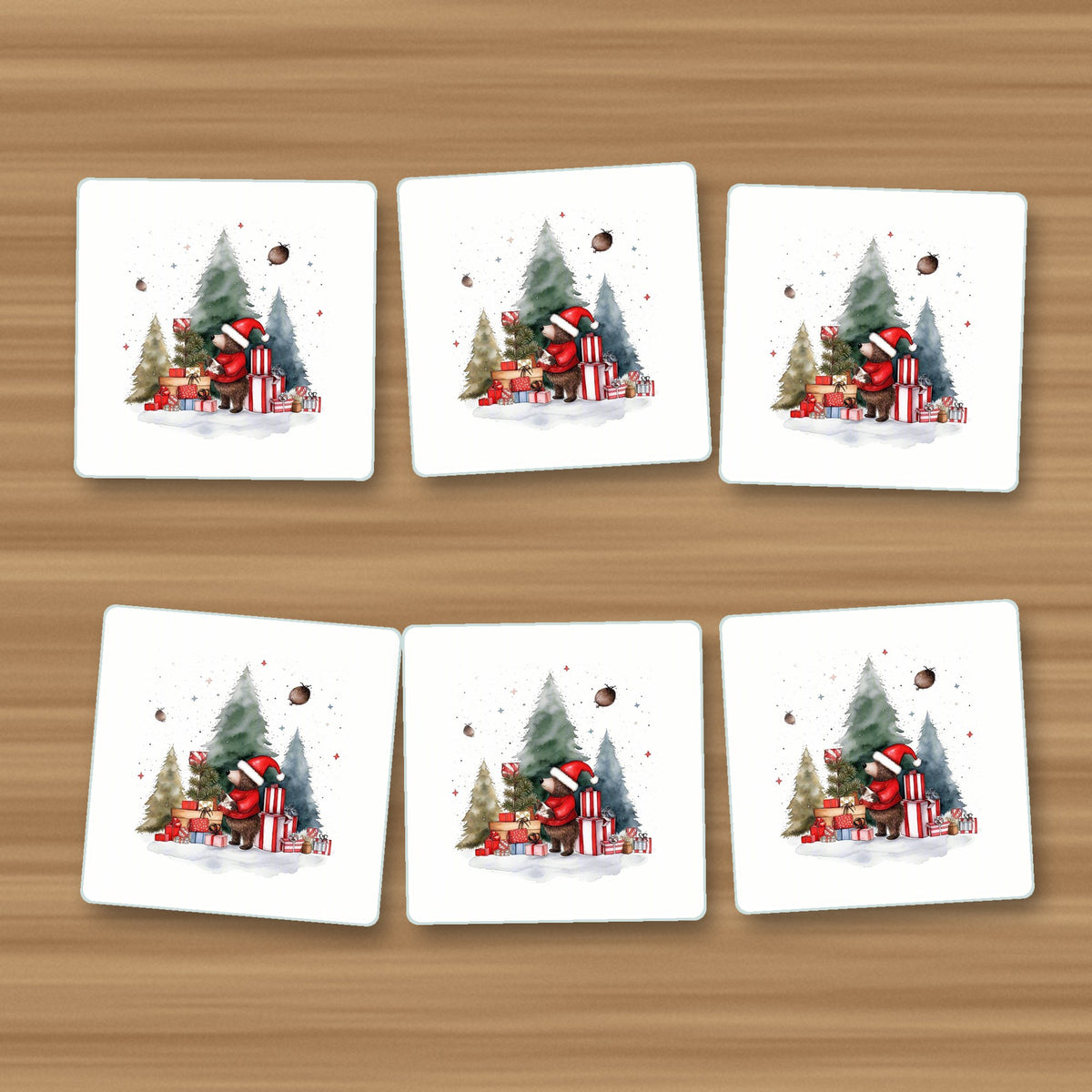 Little Bear with Christmas Presents square glass coasters, set of 6, on an oak coffee table