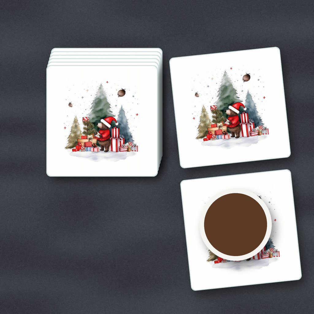 Little Bear with Christmas Presents square glass coasters stacked on a slate kitchen worktop