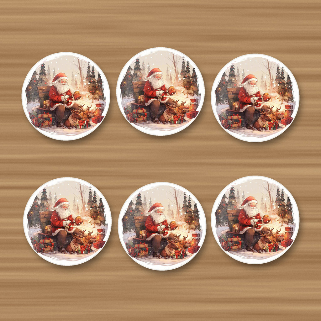 Father Christmas & Reindeer in the Woods round ceramic coasters, set of 6, on an oak coffee table