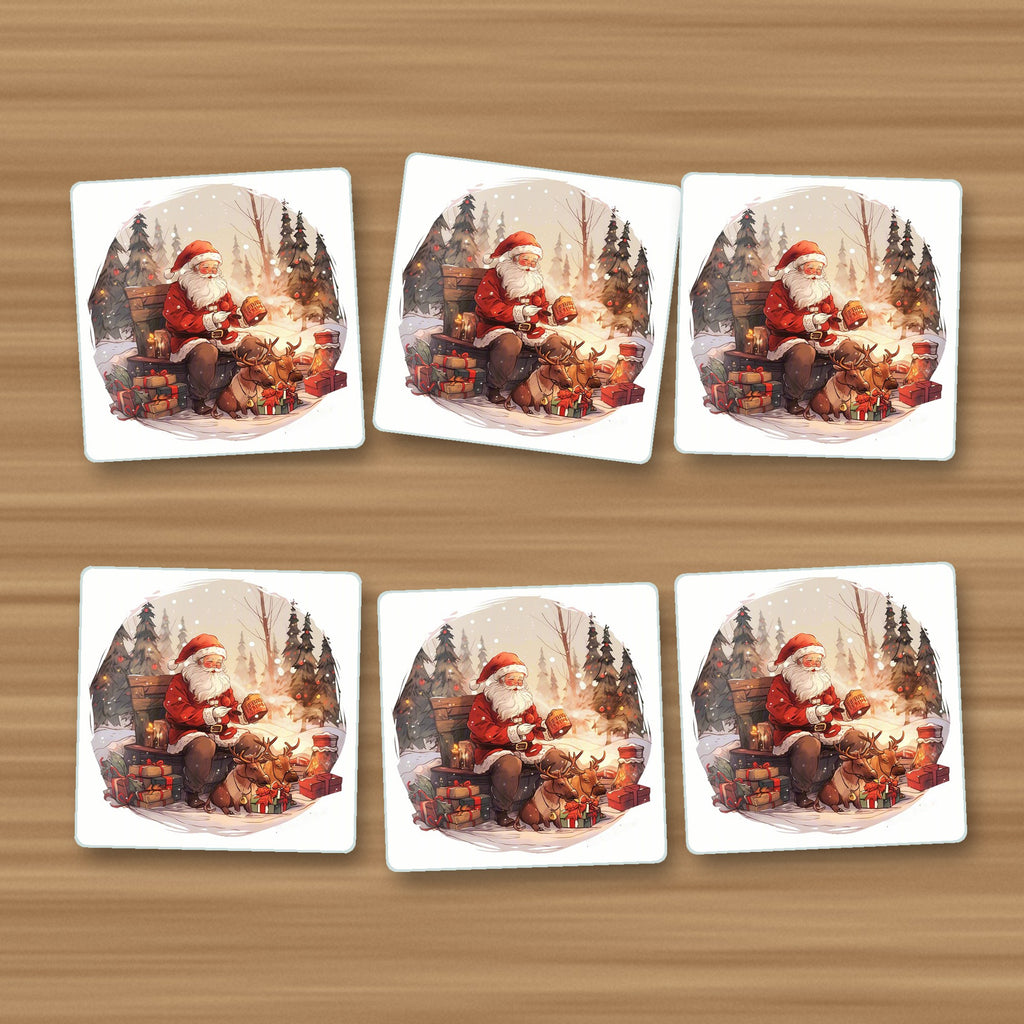 Father Christmas & Reindeer in the Woods square glass coasters, set of 6, on an oak coffee table