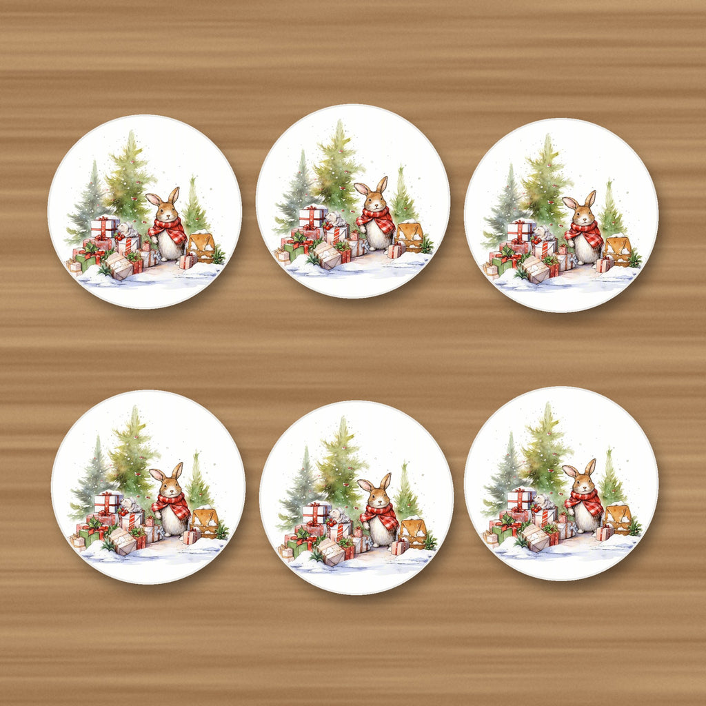 Christmas Rabbit with Presents round ceramic coasters, set of 6, on an oak coffee table