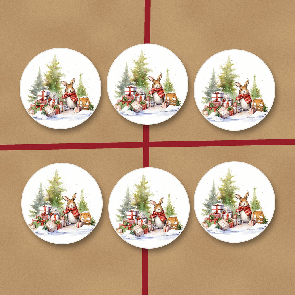 Christmas Rabbit with Presents round ceramic coasters on kraft gift wrap