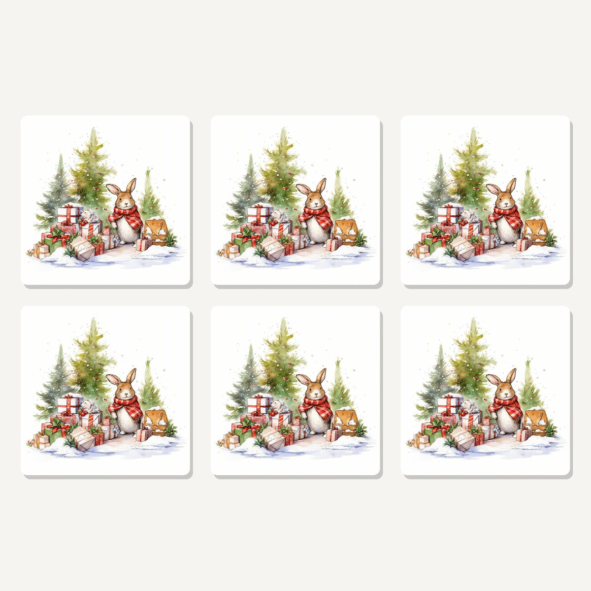 Flat lay of the christmas rabbit with presents artwork on six square coasters