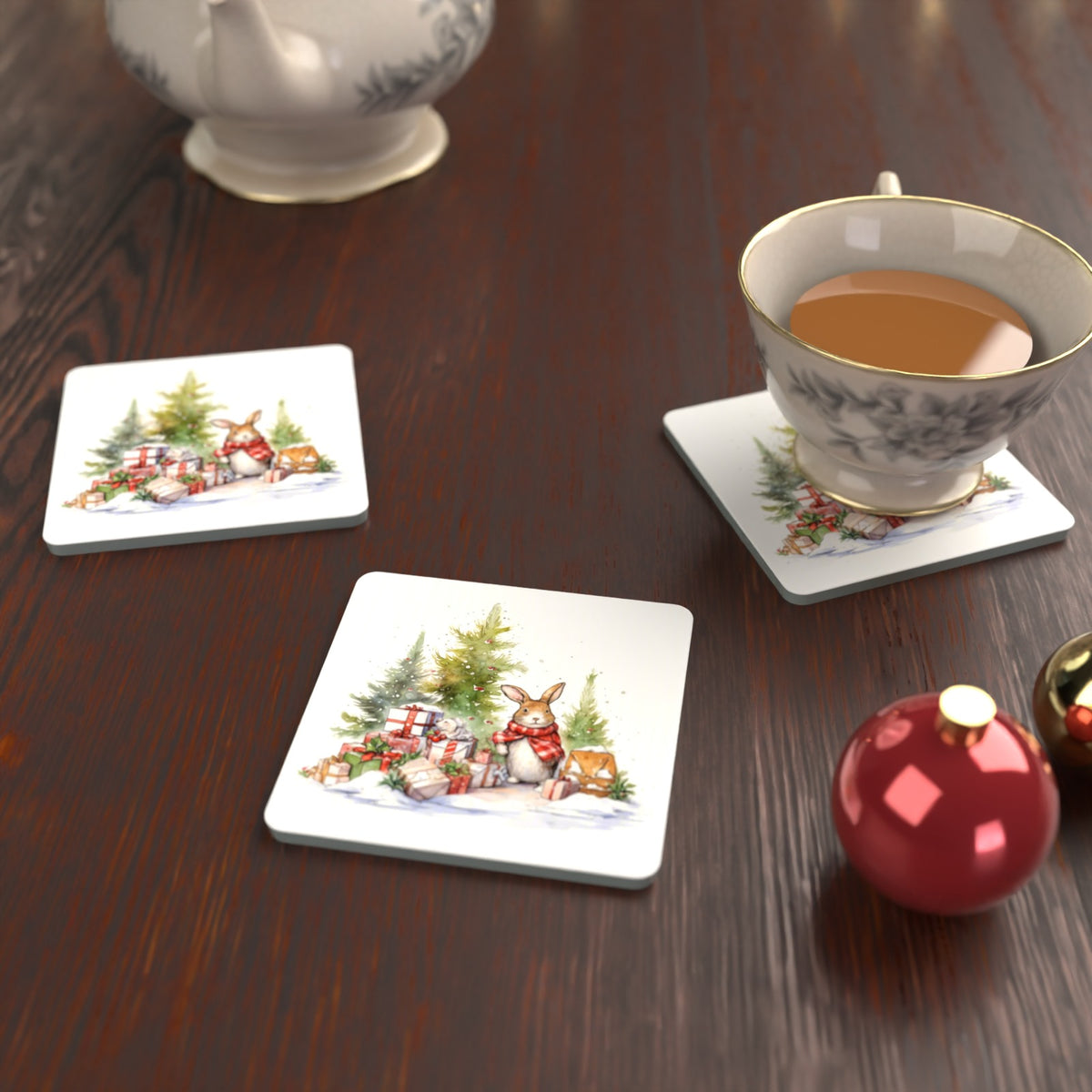 Christmas Rabbit with Presents Square Glass Coasters – Set of 6 – lifestyle mockup with a teacup