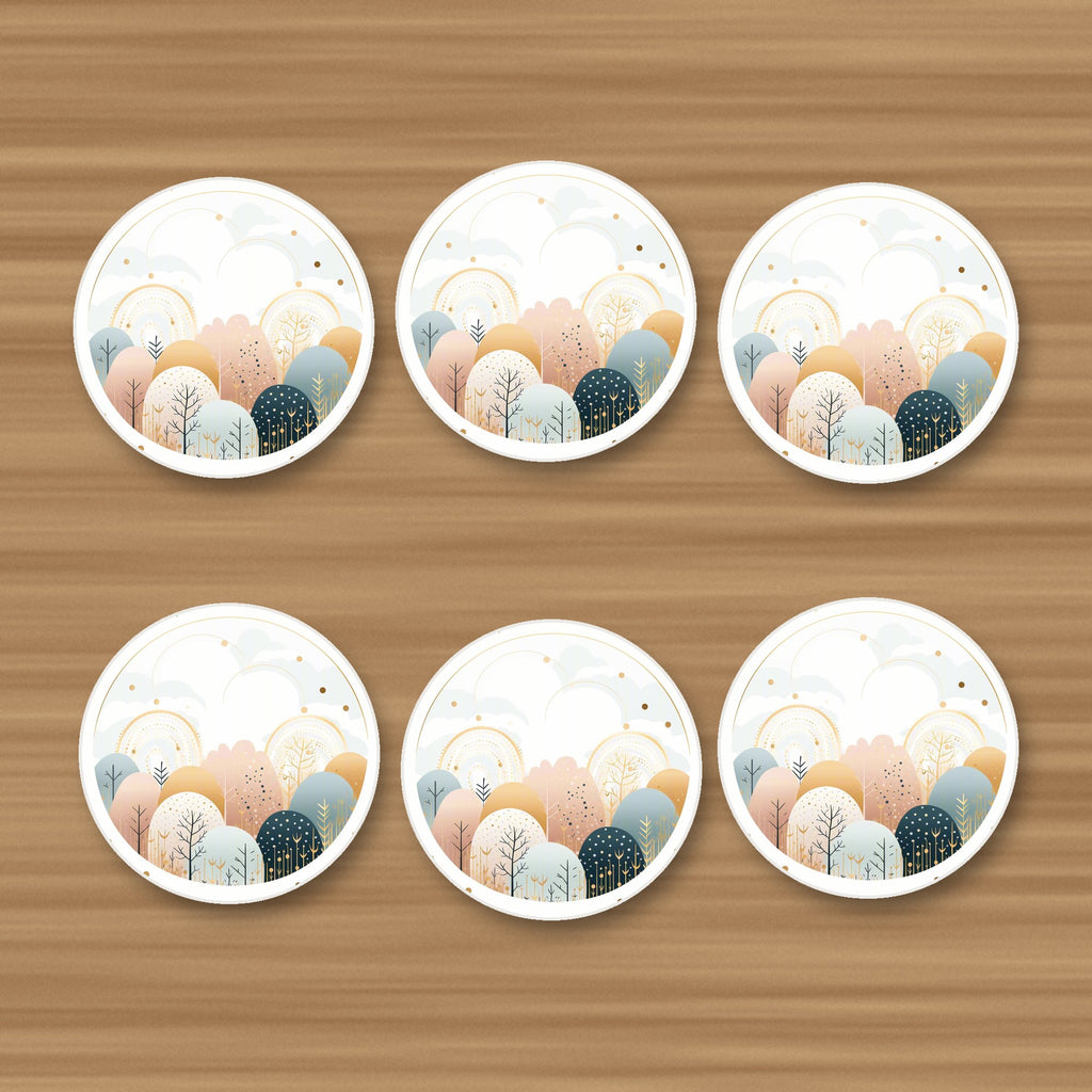 Minimalist Gold Winter Woodland Circle round ceramic coasters, set of 6, on an oak coffee table