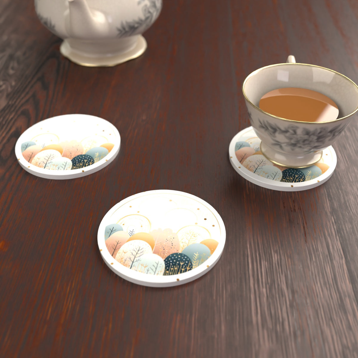 Minimalist Gold Winter Woodland Circle Round Ceramic Coasters – Set of 6 – lifestyle mockup with a teacup
