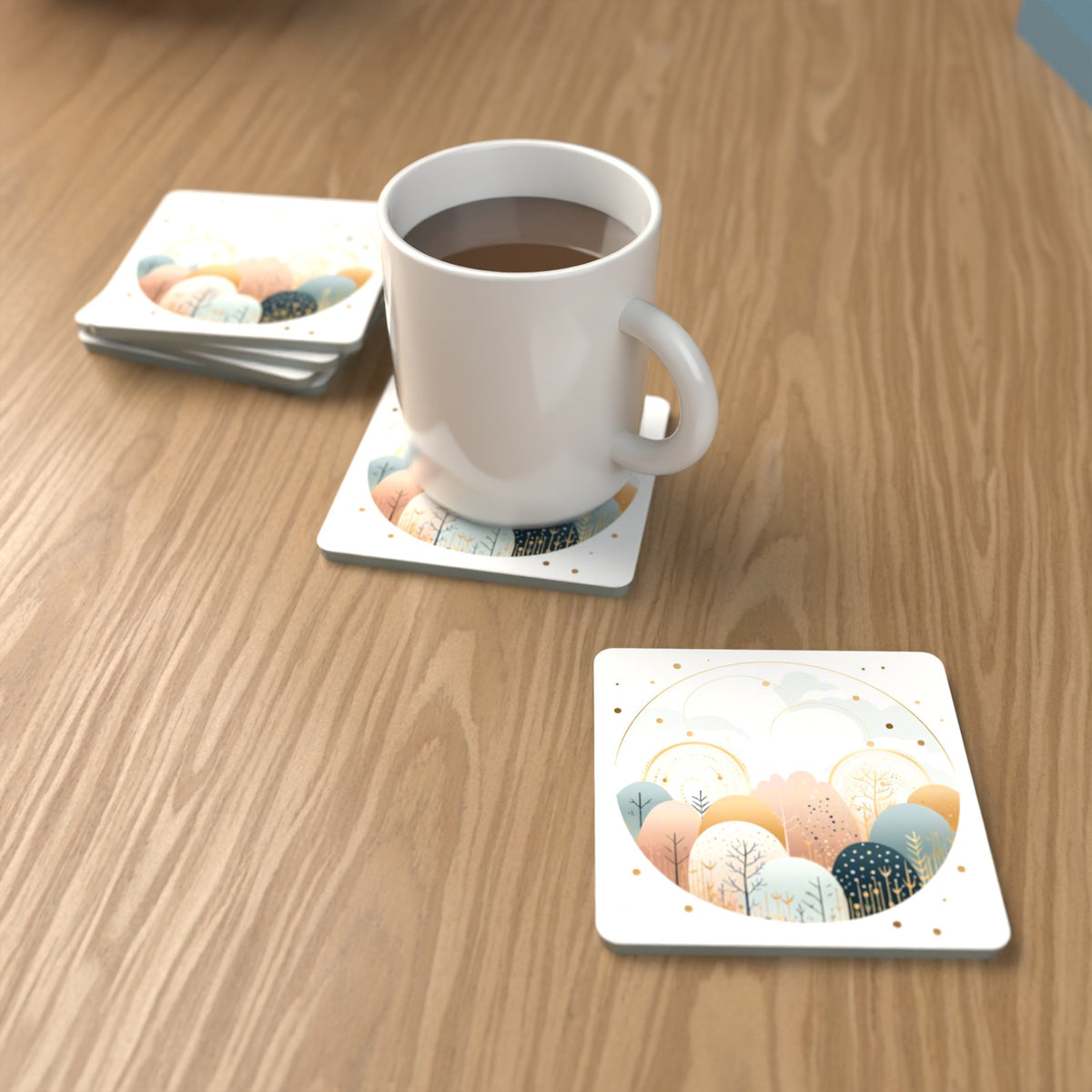 Minimalist Gold Winter Woodland Circle Square Glass Coasters – Set of 6 – lifestyle mockup with a mug of coffee