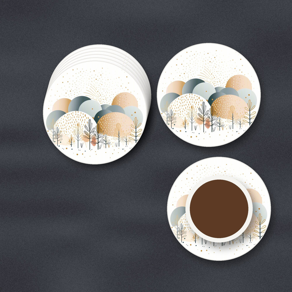 Minimalist Gold Winter Trees round ceramic coasters stacked on a slate kitchen worktop