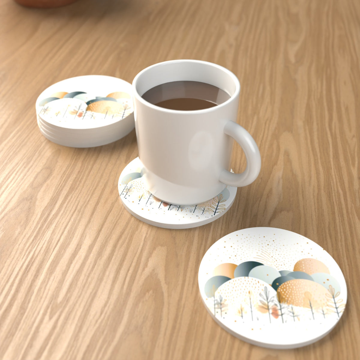 Minimalist Gold Winter Trees Round Ceramic Coasters – Set of 6 – lifestyle mockup with a mug of coffee