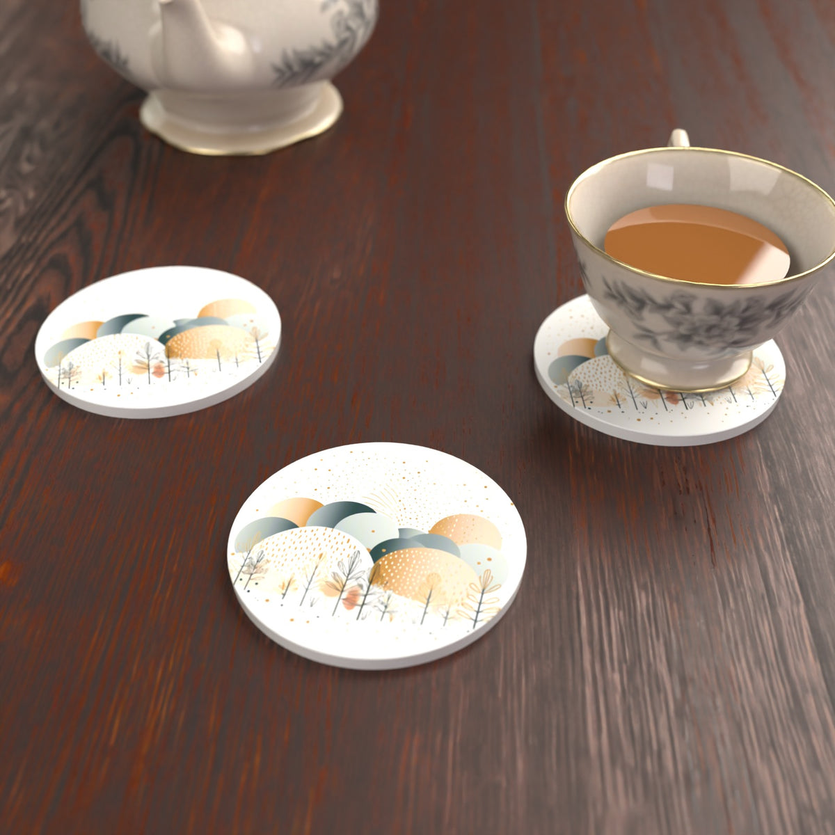 Minimalist Gold Winter Trees Round Ceramic Coasters – Set of 6 – lifestyle mockup with a teacup