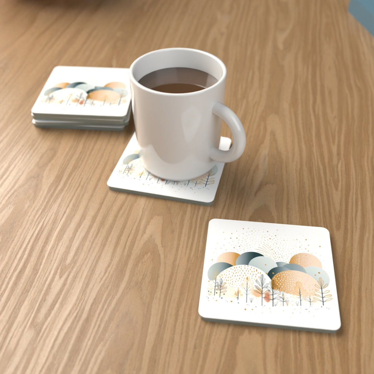 Minimalist Gold Winter Trees Square Glass Coasters – Set of 6 – lifestyle mockup with a mug of coffee