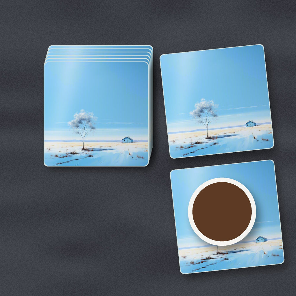 Lone Tree in a Snowy Field square glass coasters stacked on a slate kitchen worktop