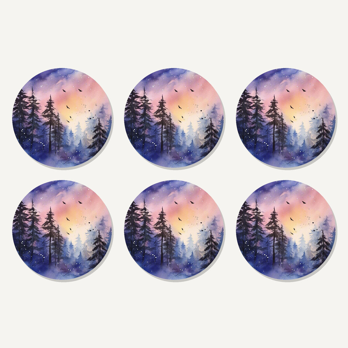 Flat lay of the watercolour winter pine forest artwork on six round coasters