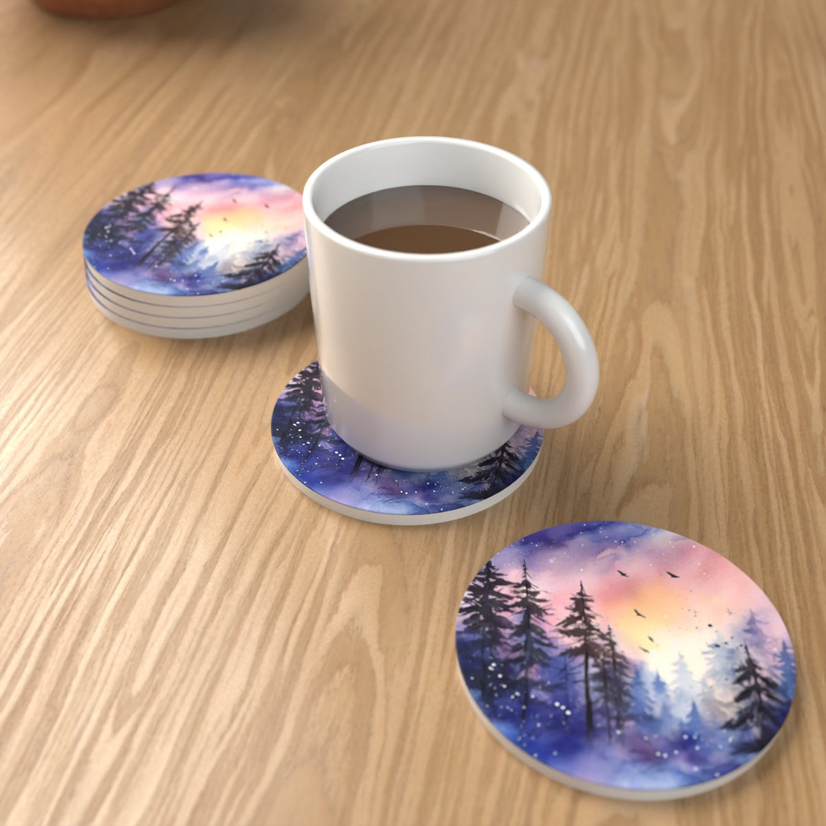 Watercolour Winter Pine Forest Round Ceramic Coasters – Set of 6 – lifestyle mockup with a mug of coffee