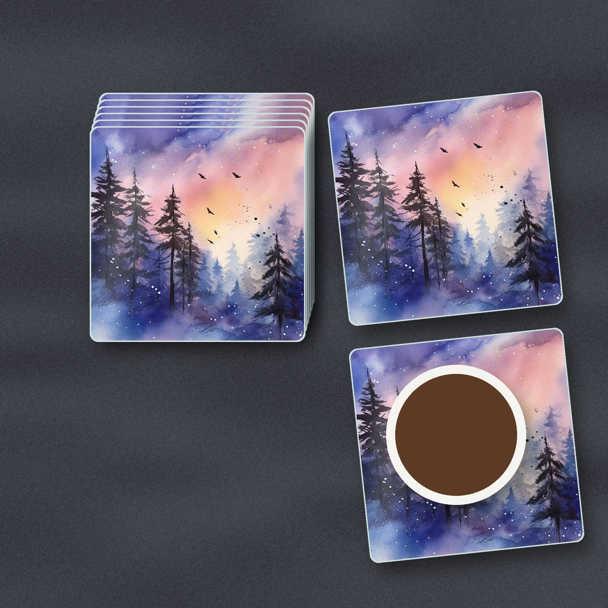 Watercolour Winter Pine Forest square glass coasters stacked on a slate kitchen worktop