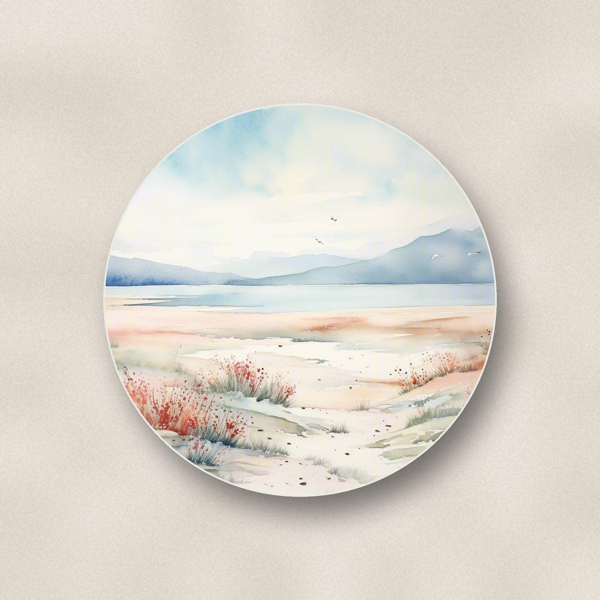 Close-up of one watercolour winter shore round ceramic coaster, flat UV print