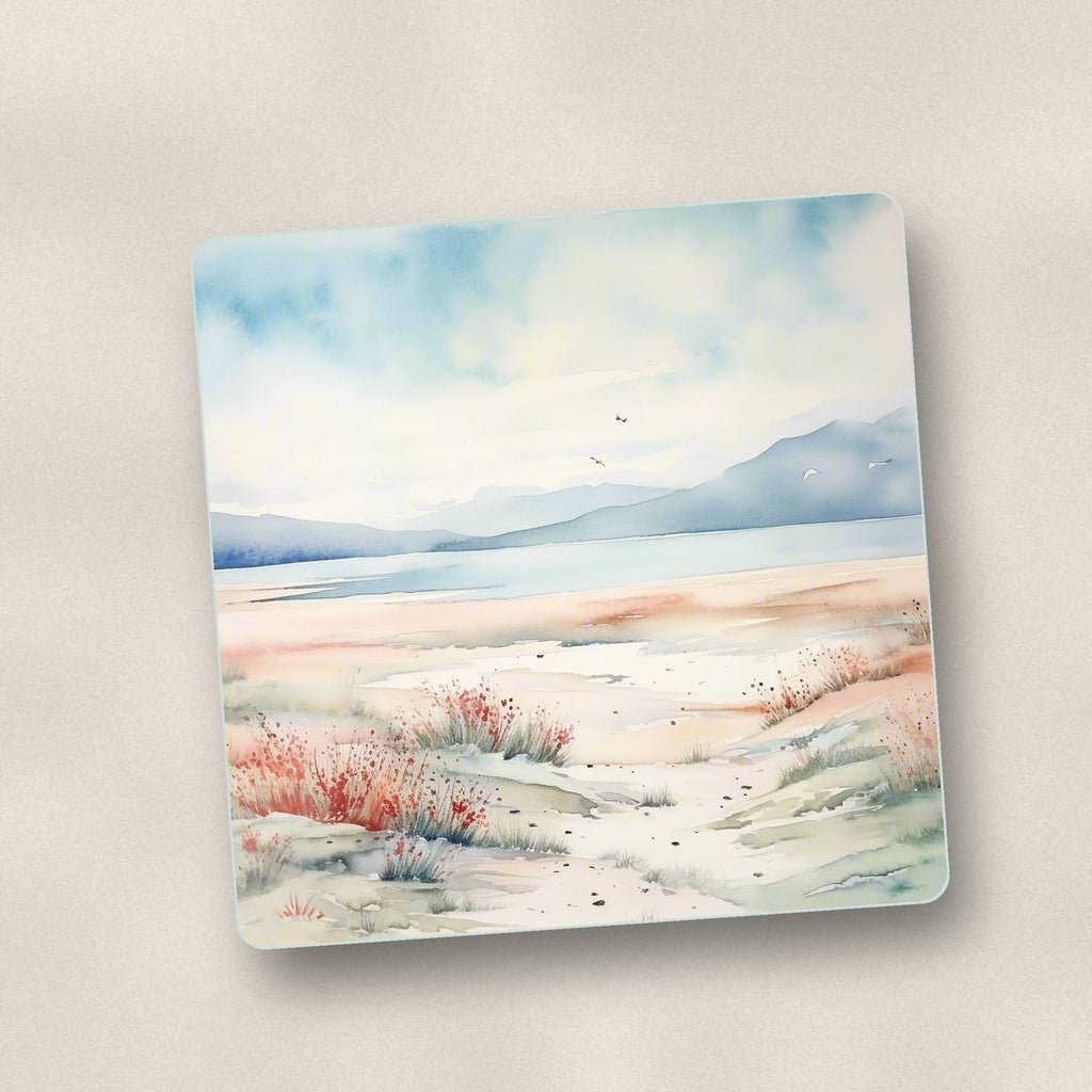 Close-up of one watercolour winter shore square glass coaster, flat UV print