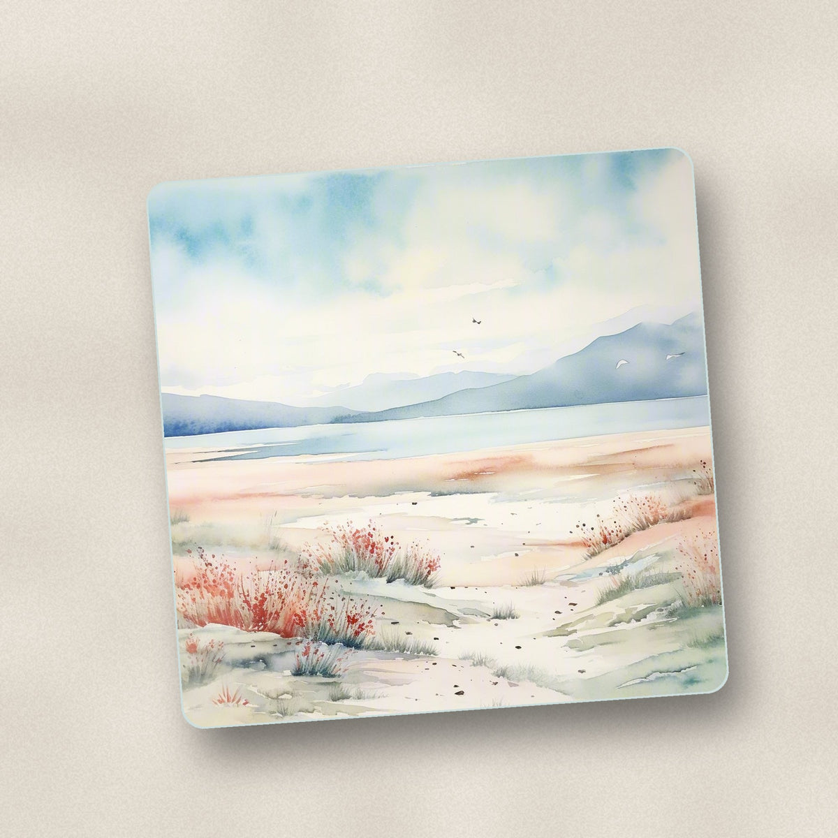 Close-up of one watercolour winter shore square glass coaster, flat UV print
