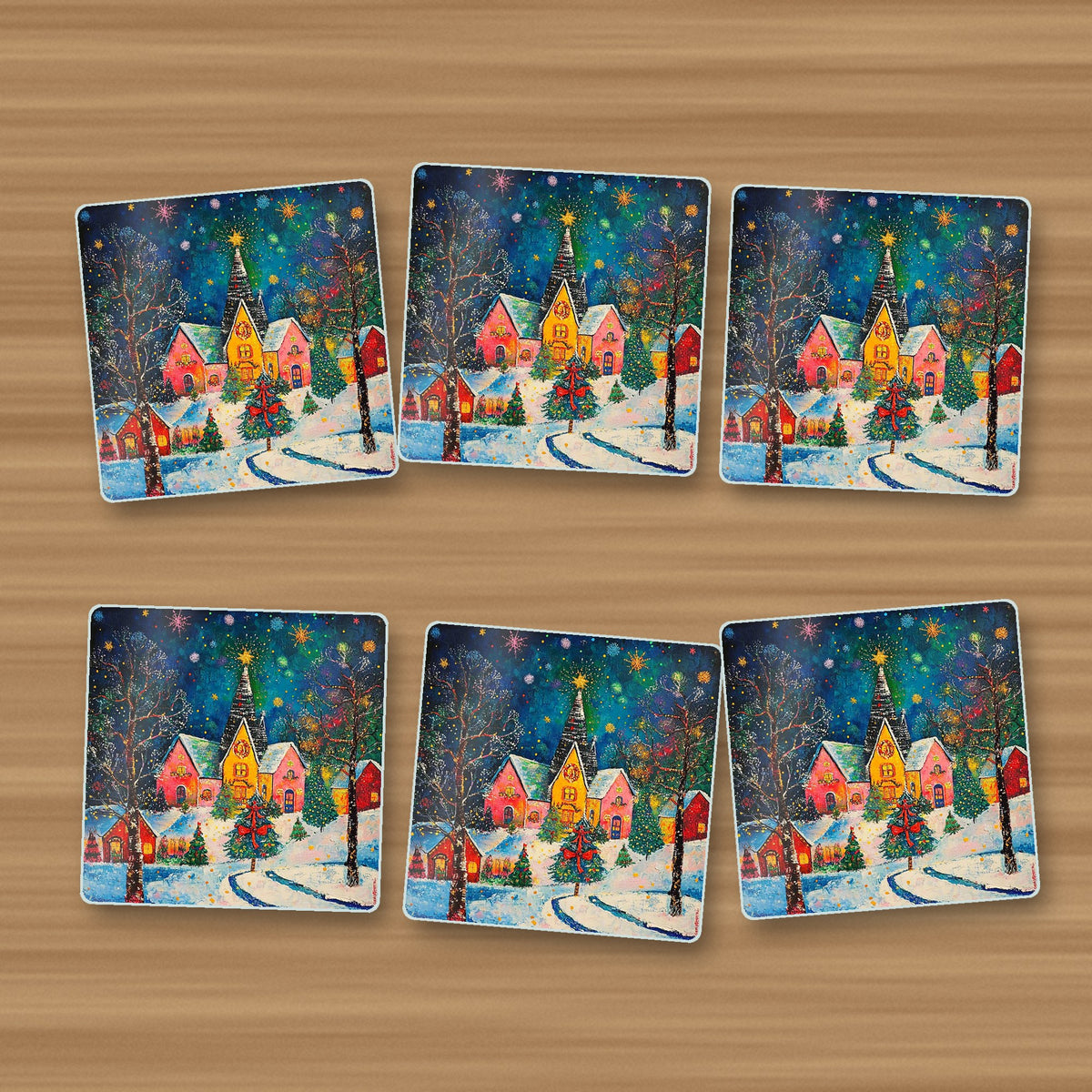 Colourful Christmas Village Night square glass coasters, set of 6, on an oak coffee table
