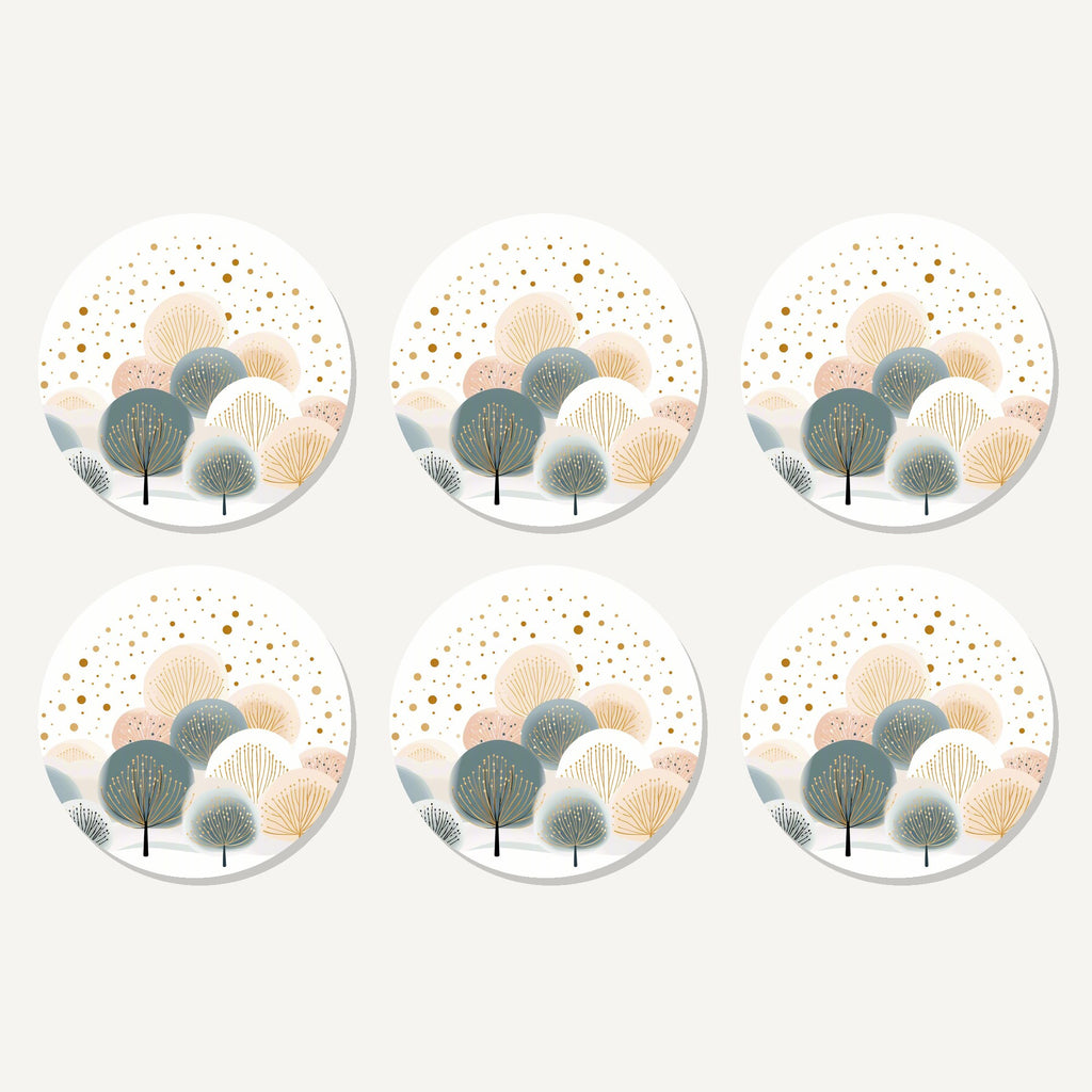 Flat lay of the minimalist gold dotted trees artwork on six round coasters