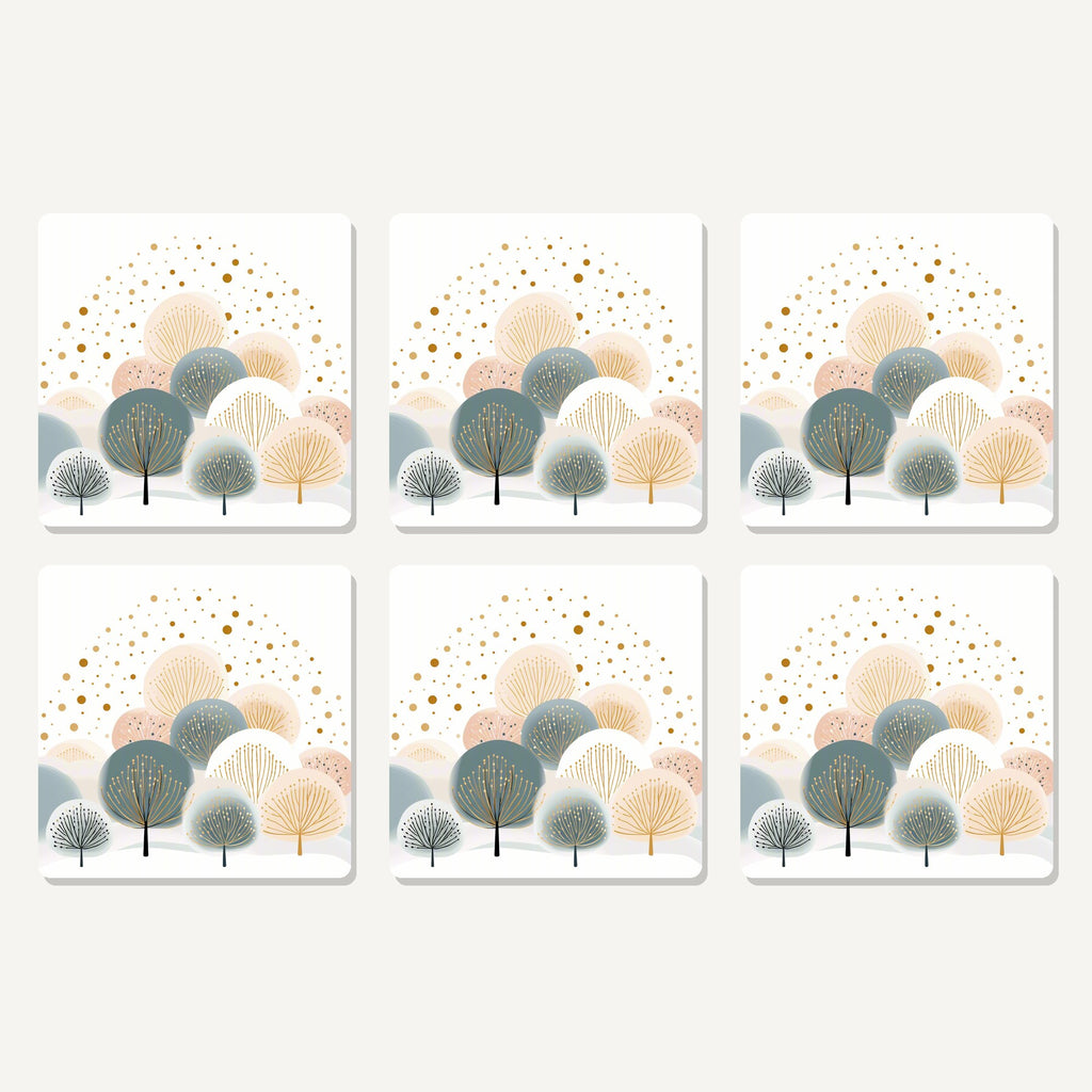Flat lay of the minimalist gold dotted trees artwork on six square coasters