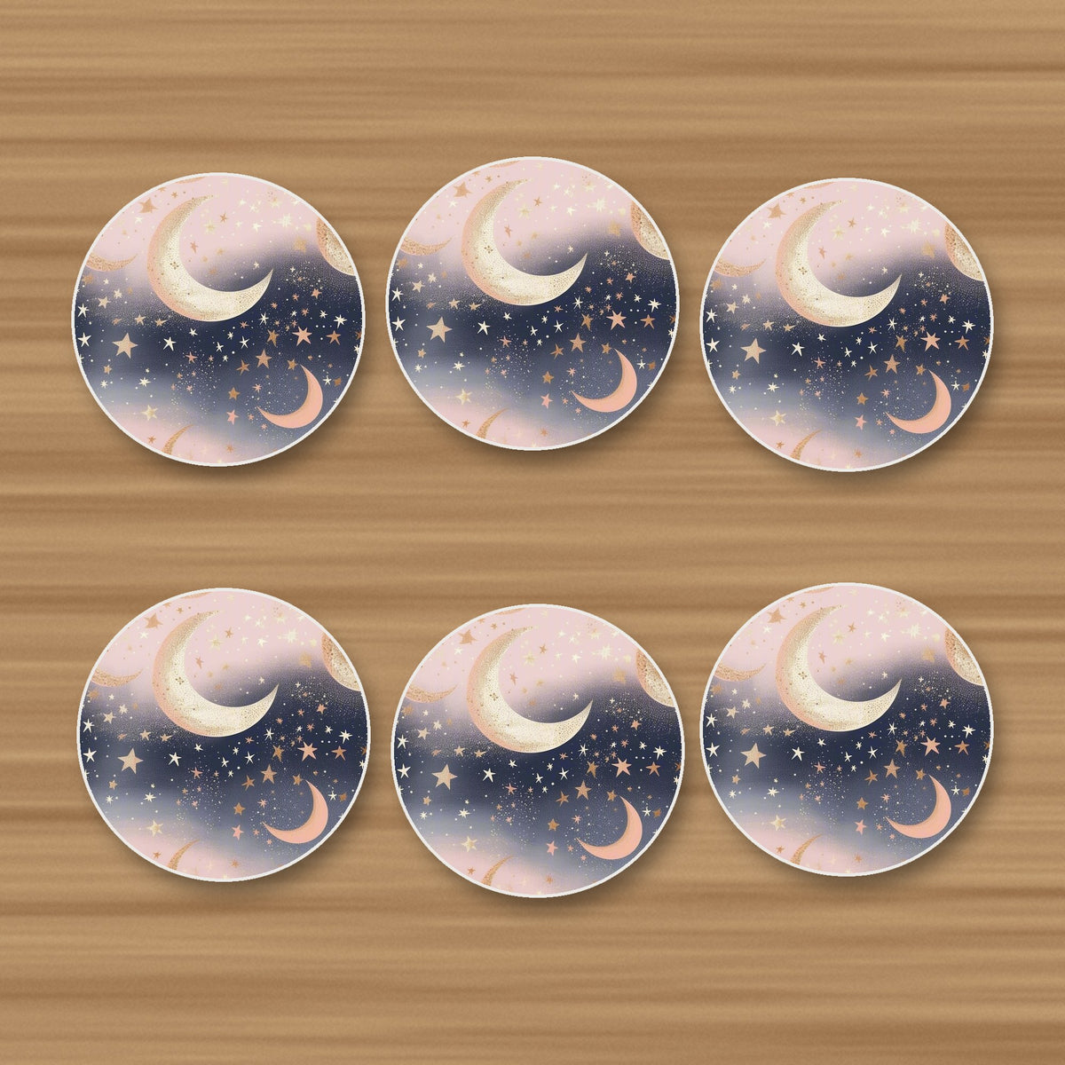 Pastel Crescent Moons & Stars round ceramic coasters, set of 6, on an oak coffee table