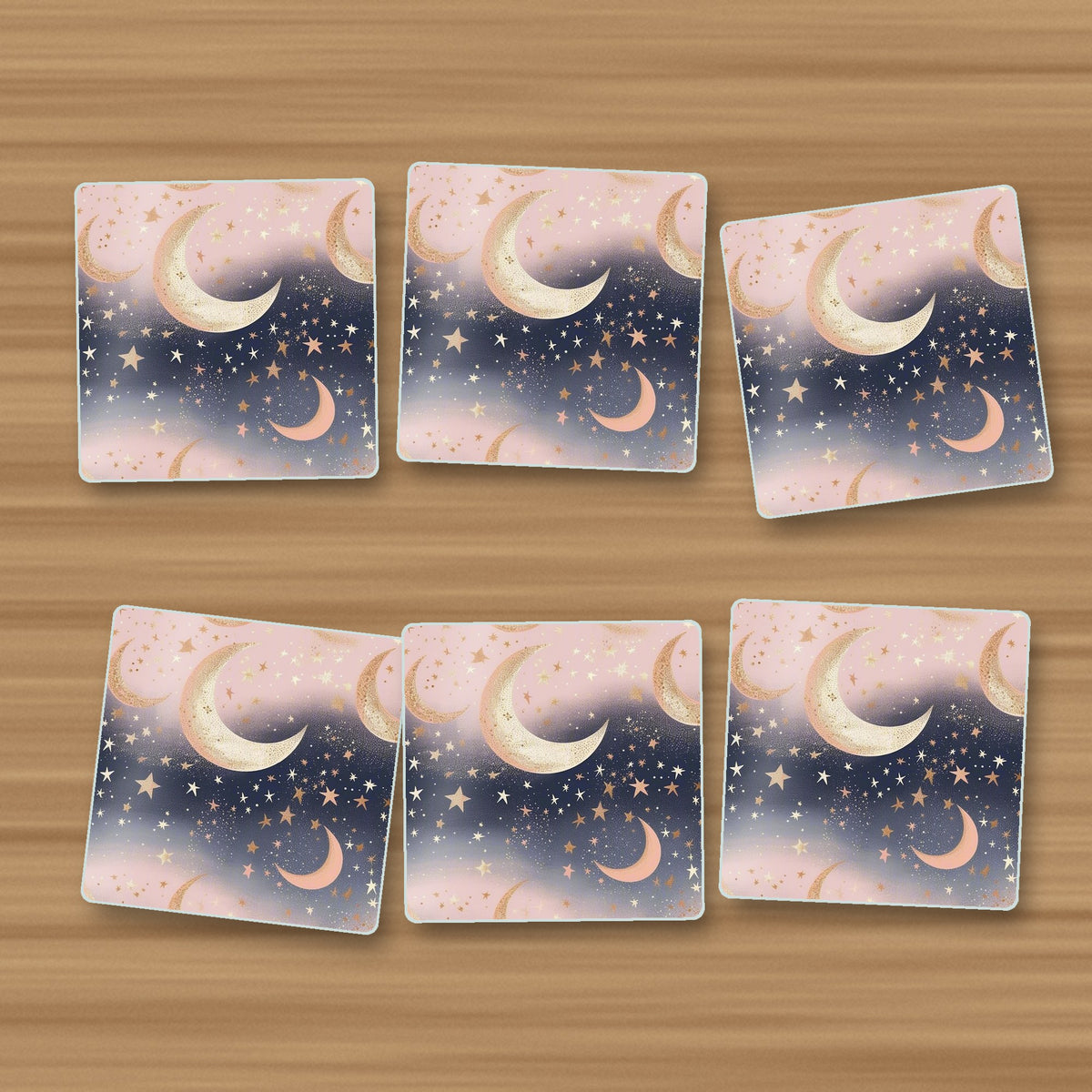 Pastel Crescent Moons & Stars square glass coasters, set of 6, on an oak coffee table