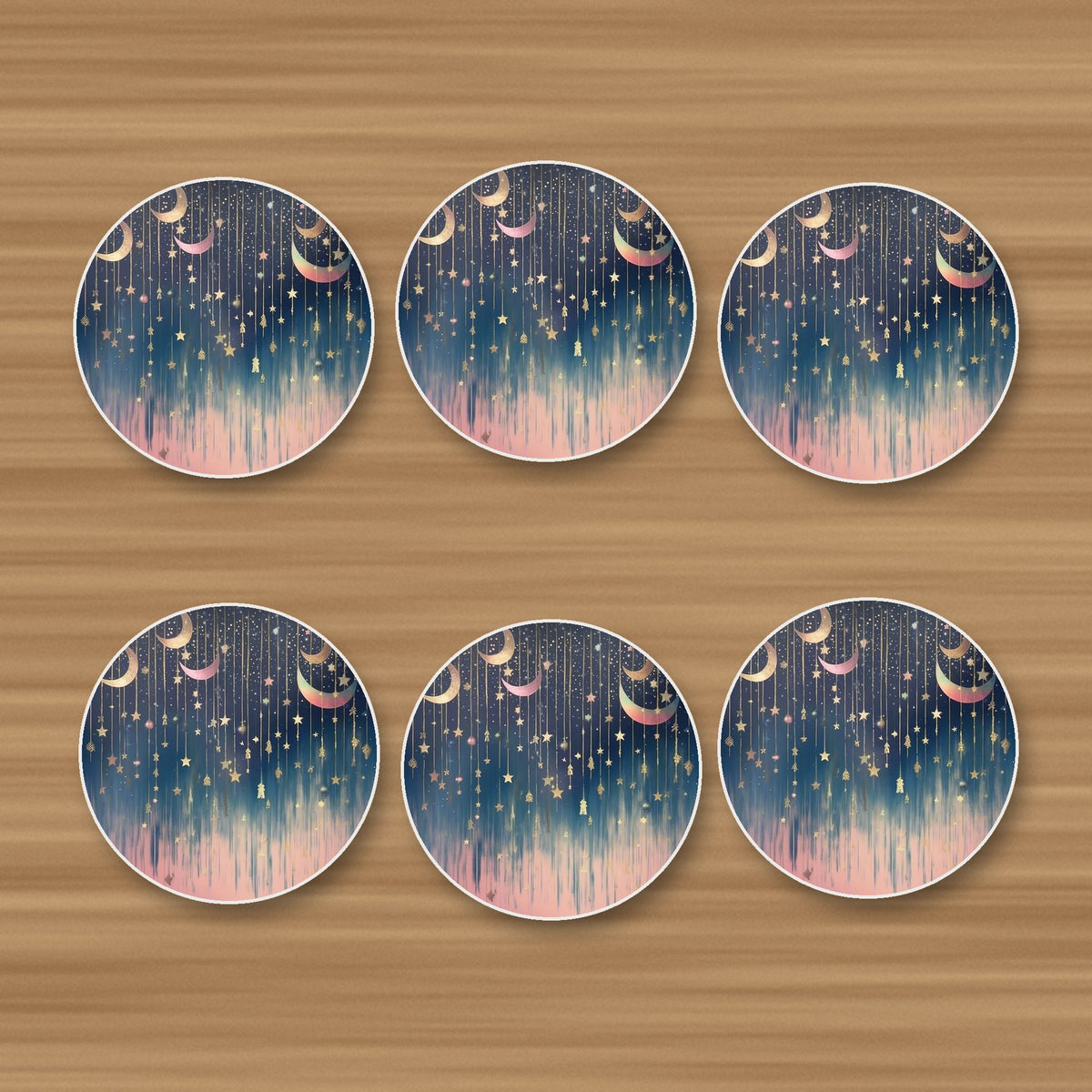 Hanging Moons & Stars round ceramic coasters, set of 6, on an oak coffee table