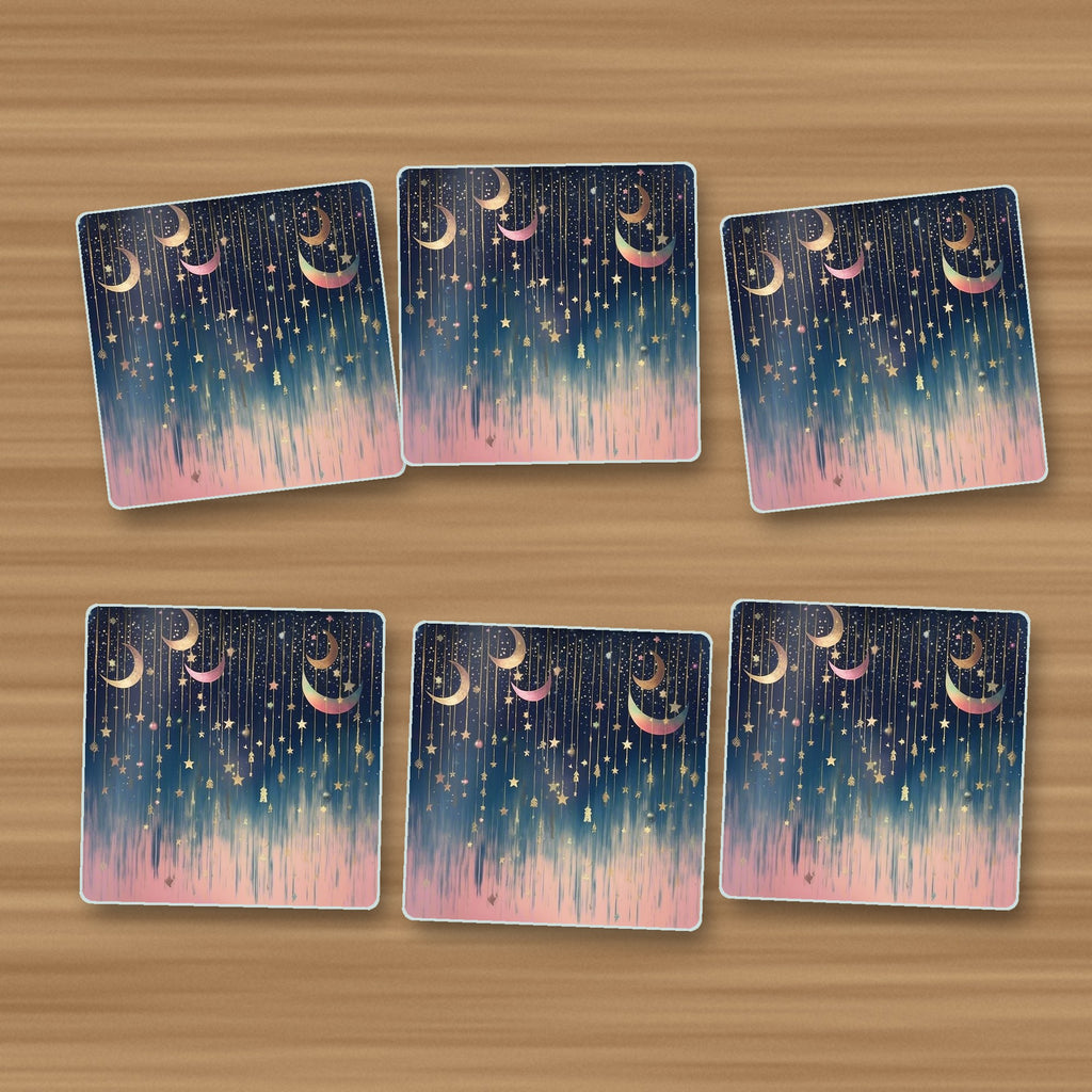 Hanging Moons & Stars square glass coasters, set of 6, on an oak coffee table