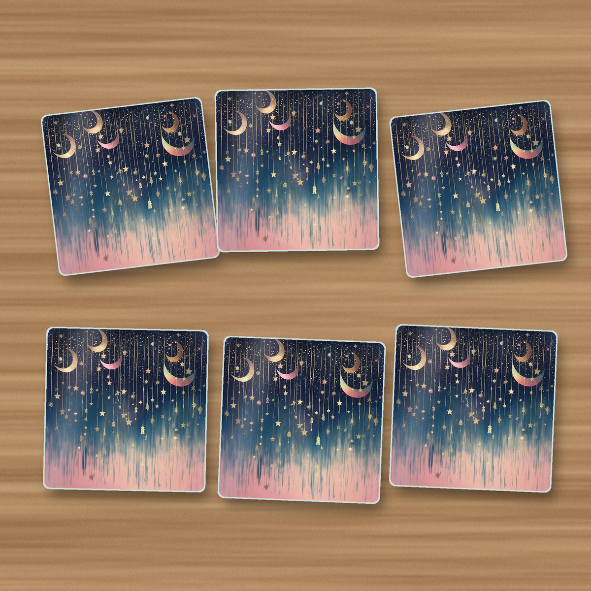 Hanging Moons & Stars square glass coasters, set of 6, on an oak coffee table
