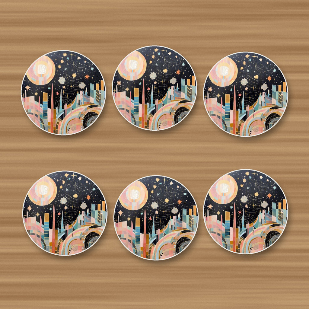 Celestial Pastel Skyline round ceramic coasters, set of 6, on an oak coffee table