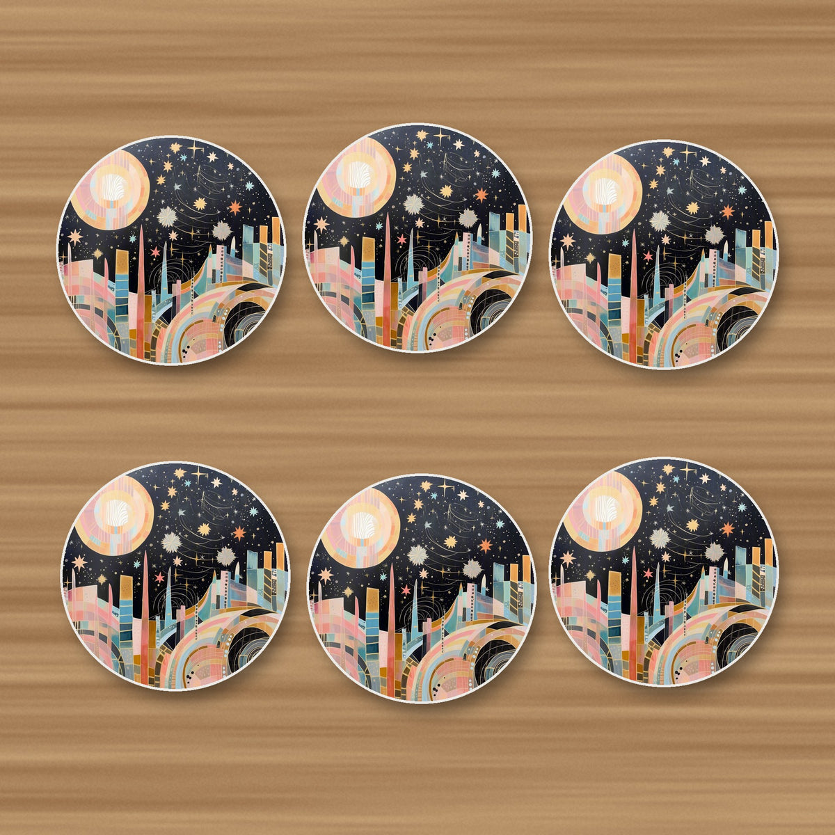 Celestial Pastel Skyline round ceramic coasters, set of 6, on an oak coffee table