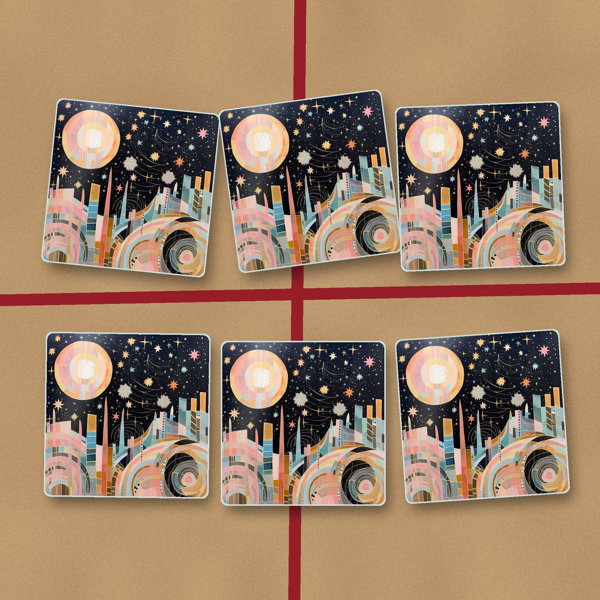 Celestial Pastel Skyline square glass coasters on kraft gift wrap
