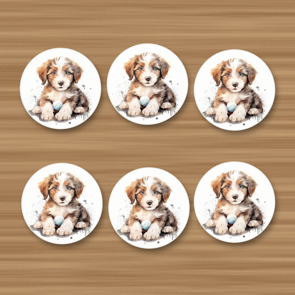 Watercolour Fluffy Puppy with Ball round ceramic coasters, set of 6, on an oak coffee table