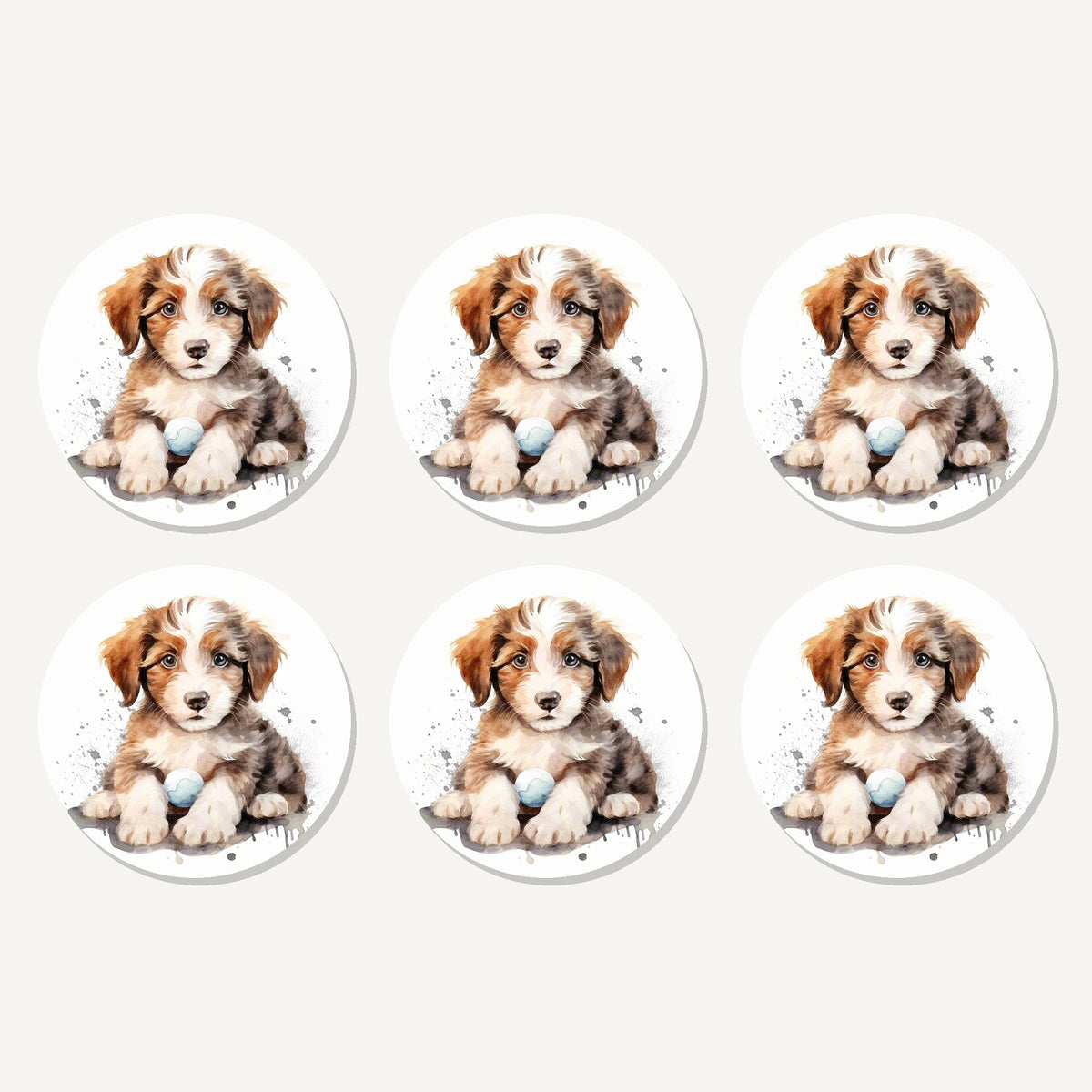 Flat lay of the watercolour fluffy puppy with ball artwork on six round coasters