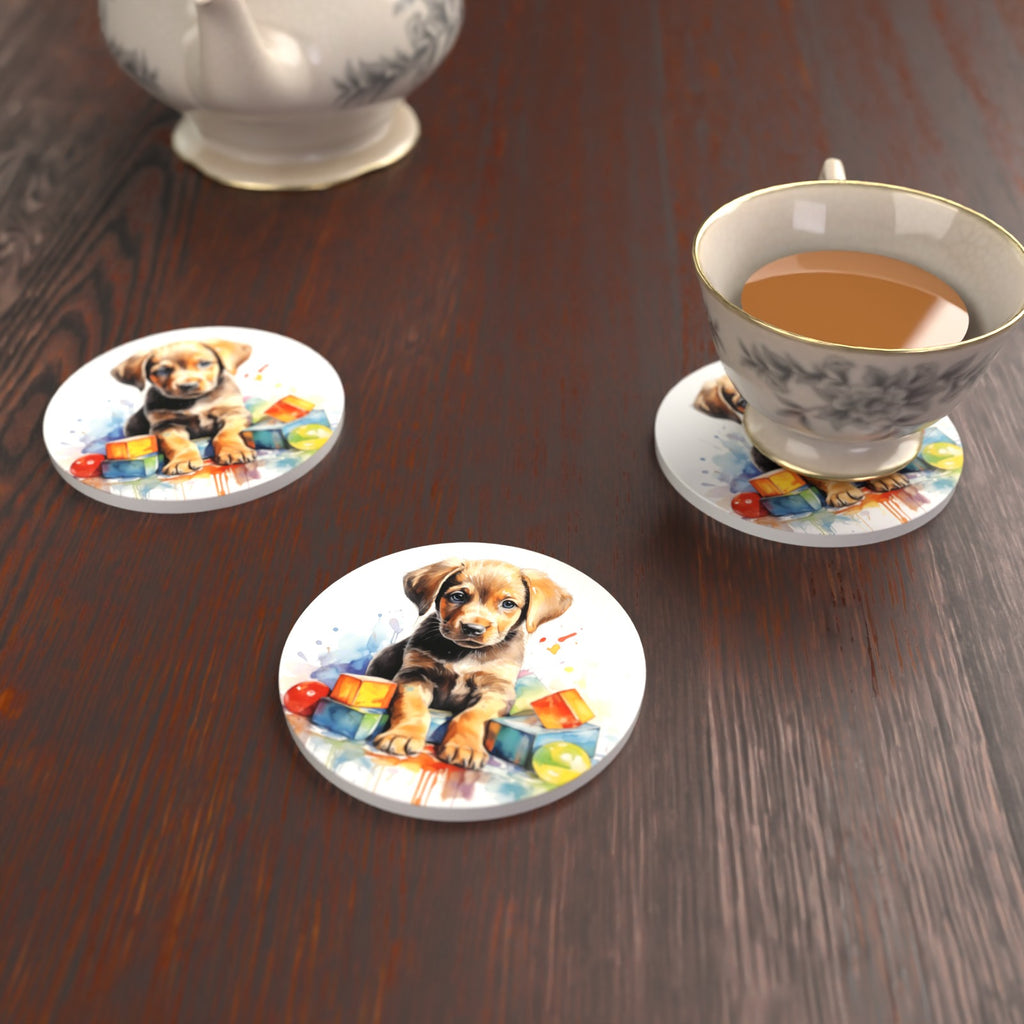Puppy with Toy Blocks Round Ceramic Coasters – Set of 6 – lifestyle mockup with a teacup