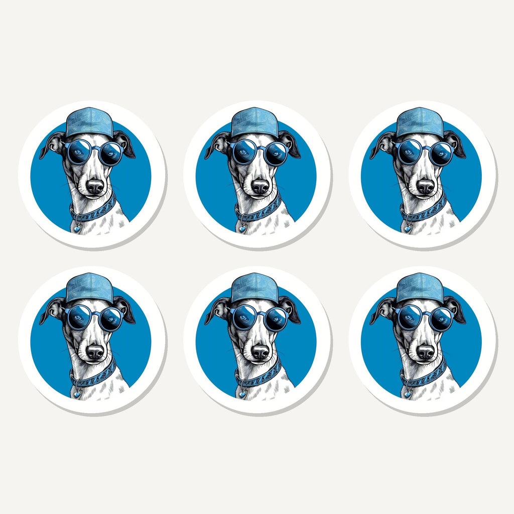 Flat lay of the cool whippet in cap & shades artwork on six round coasters