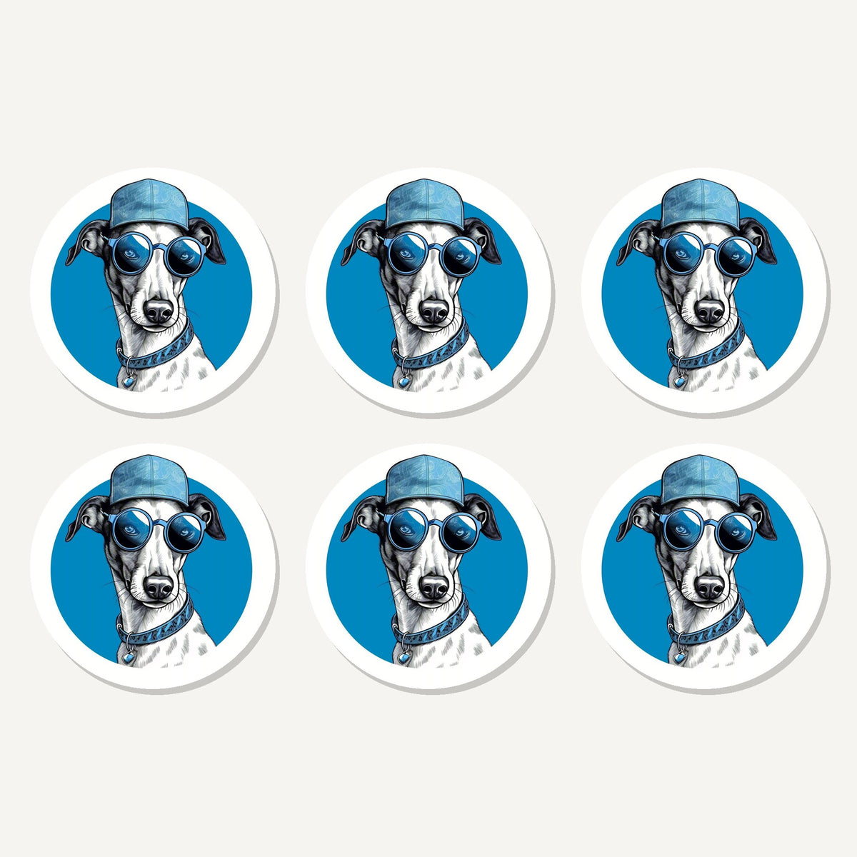 Flat lay of the cool whippet in cap & shades artwork on six round coasters