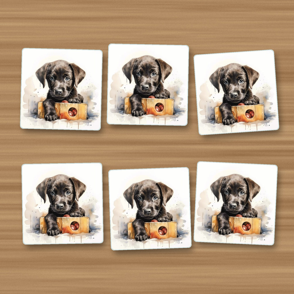 Black Labrador Puppy with Toy Box square glass coasters, set of 6, on an oak coffee table