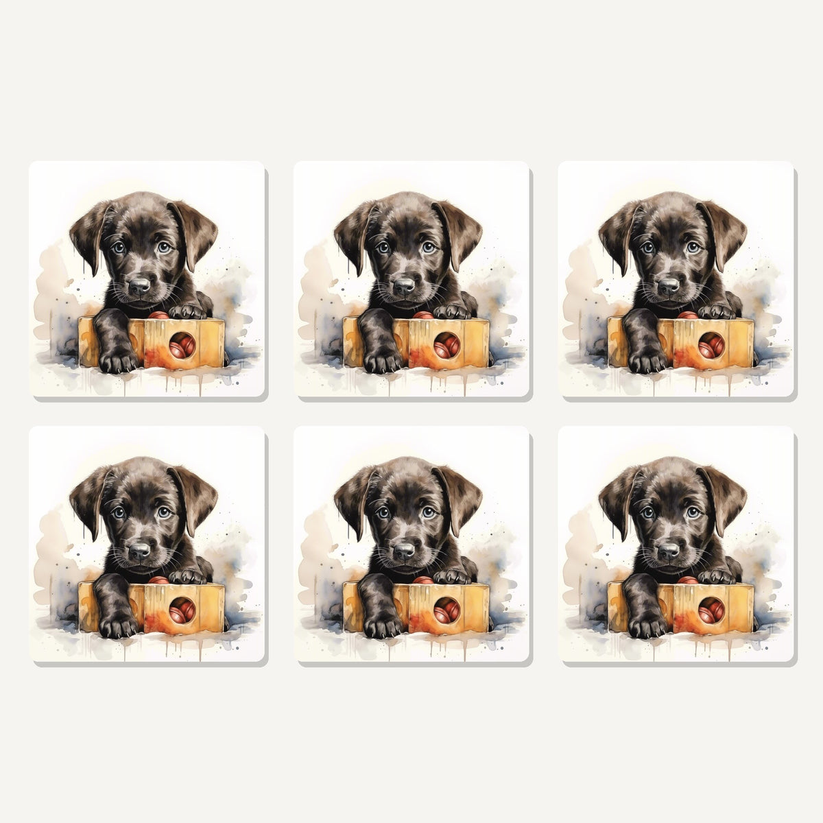 Flat lay of the black labrador puppy with toy box artwork on six square coasters
