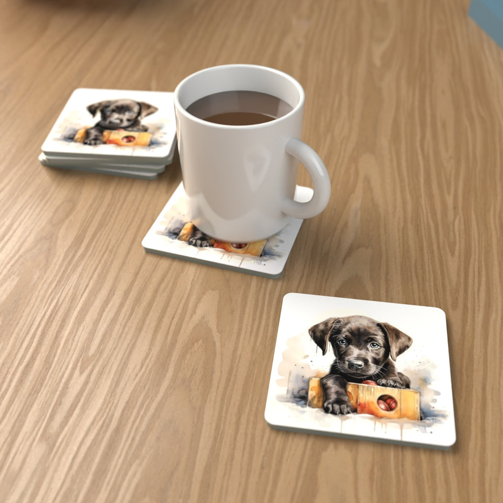 Black Labrador Puppy with Toy Box Square Glass Coasters – Set of 6 – lifestyle mockup with a mug of coffee