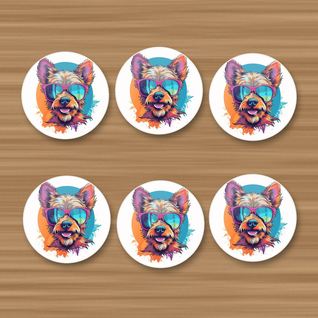 Terrier in Pink Sunglasses round ceramic coasters, set of 6, on an oak coffee table