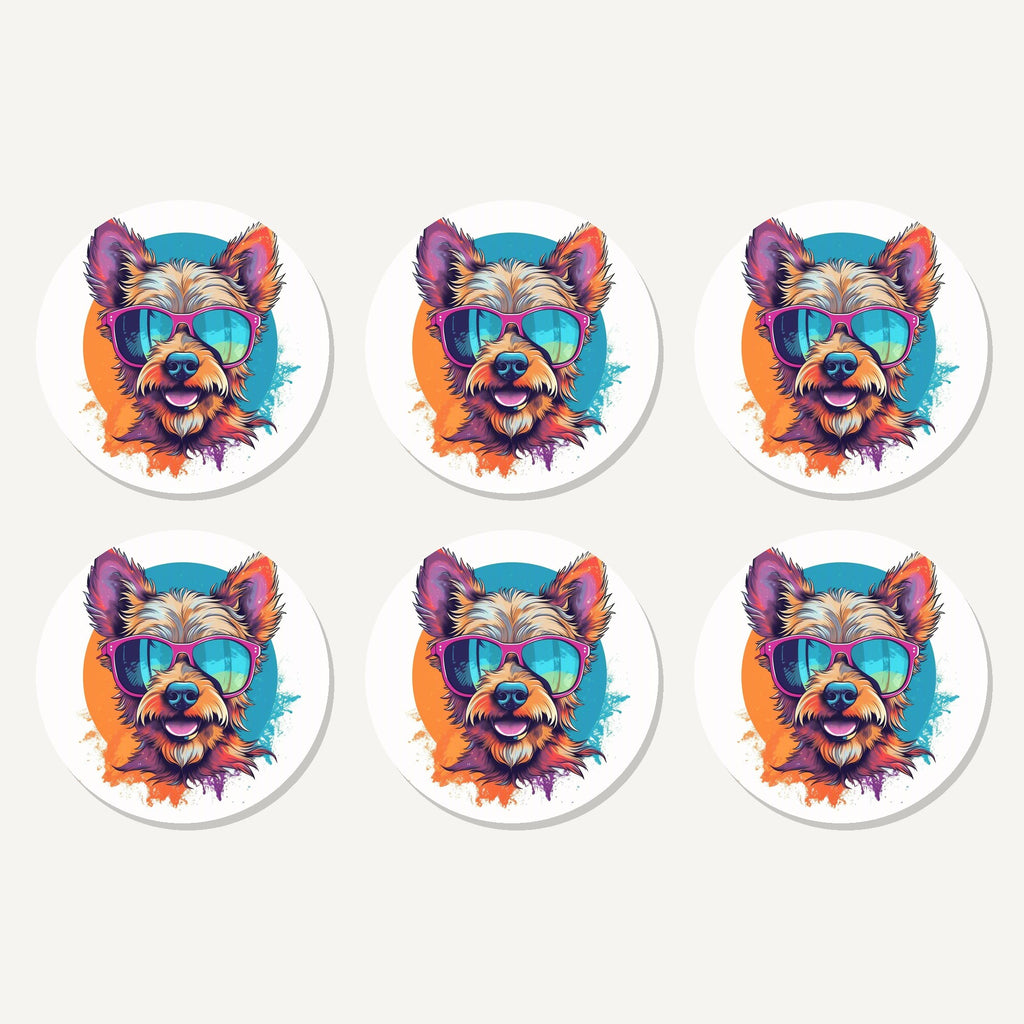 Flat lay of the terrier in pink sunglasses artwork on six round coasters