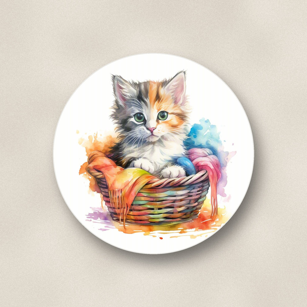 Close-up of one kitten in a wool basket round ceramic coaster, flat UV print