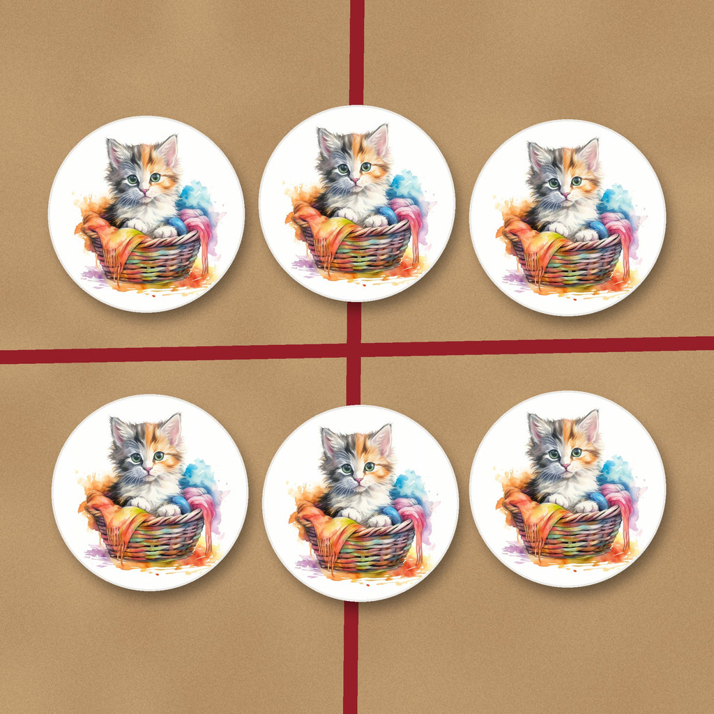 Kitten in a Wool Basket round ceramic coasters on kraft gift wrap