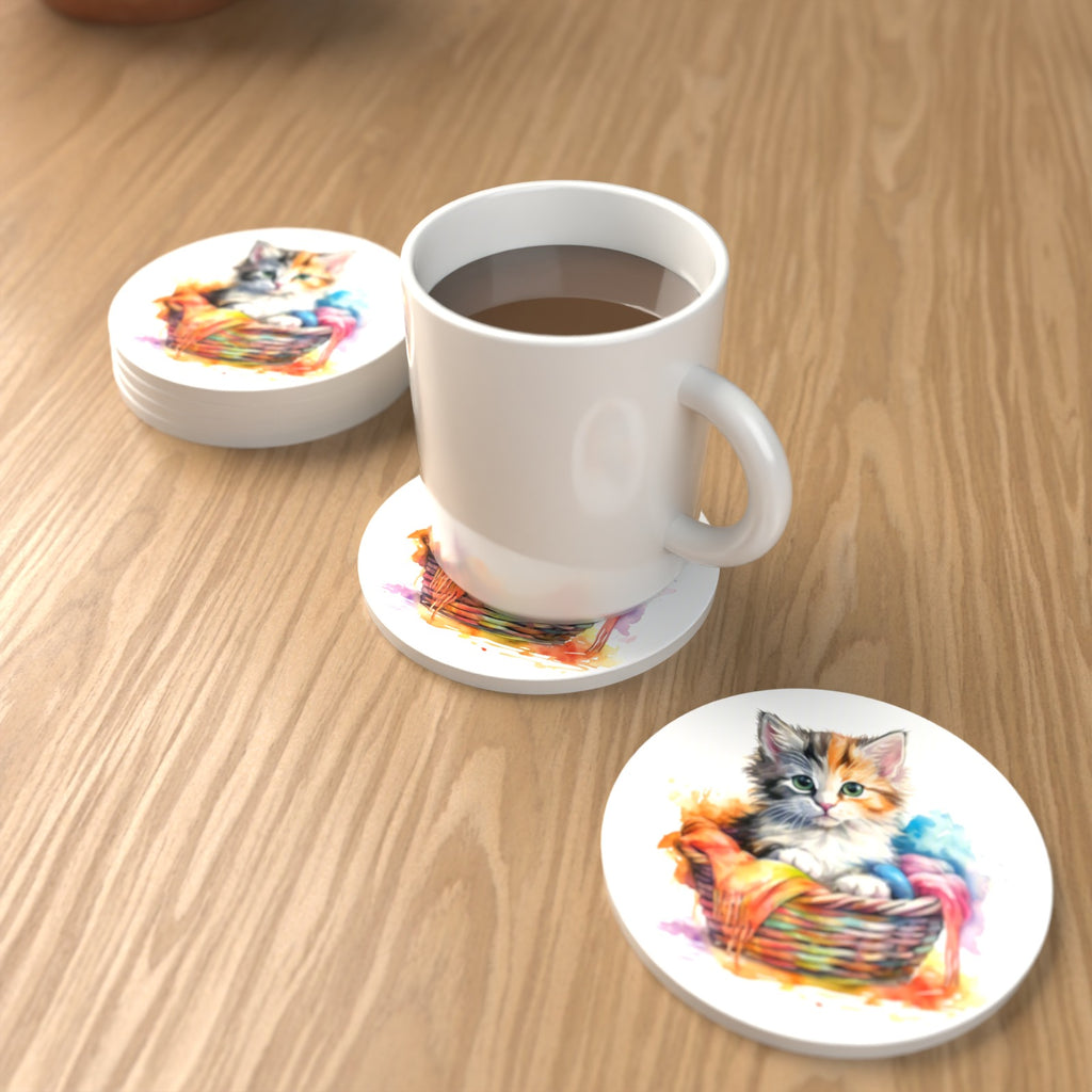 Kitten in a Wool Basket Round Ceramic Coasters – Set of 6 – lifestyle mockup with a mug of coffee