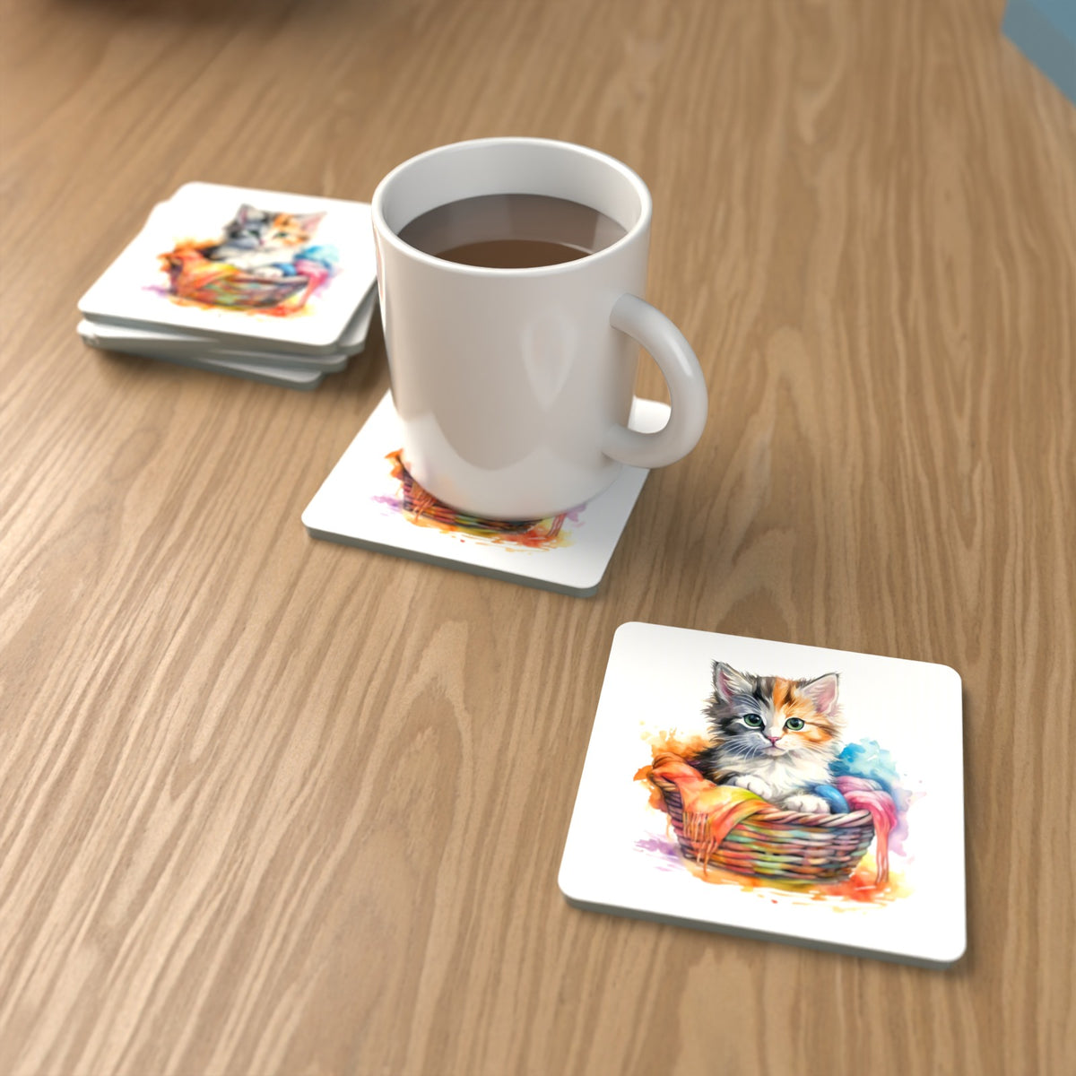 Kitten in a Wool Basket Square Glass Coasters – Set of 6 – lifestyle mockup with a mug of coffee